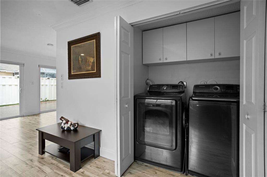 9837 Northwest 2nd Court Plantation, FL 33324 - Photo 60 of 69 a kitchen with stainless steel appliances granite countertop a refrigerator and a stove