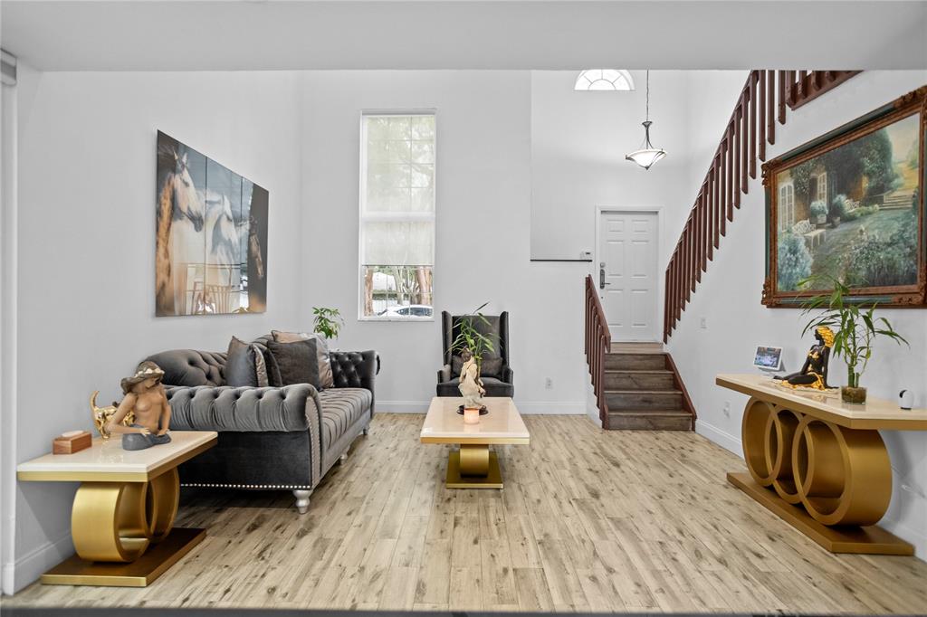 9837 Northwest 2nd Court Plantation, FL 33324 - Photo 8 of 69 a living room with furniture and wooden floor