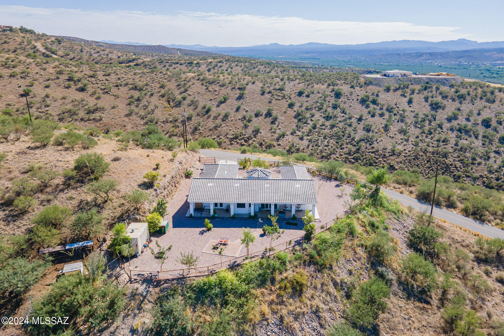 176 Avenida Ostion Rio Rico, AZ 85648 - Photo 4 of 48 an aerial view of a house with a garden