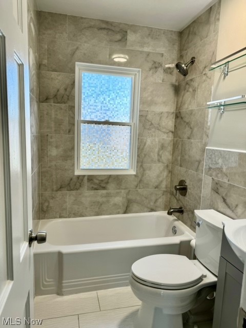 1508 Winchester Road Lyndhurst, OH 44124 - Photo 12 of 23 Full bathroom with vanity, toilet, tile floors, and tiled shower / bath