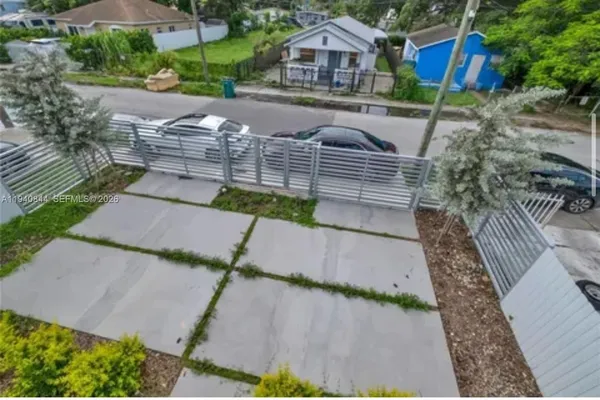 a view of a backyard with plants