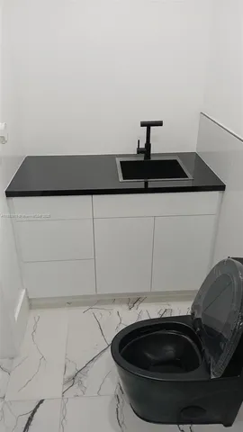 a close view of a sink in a bathroom