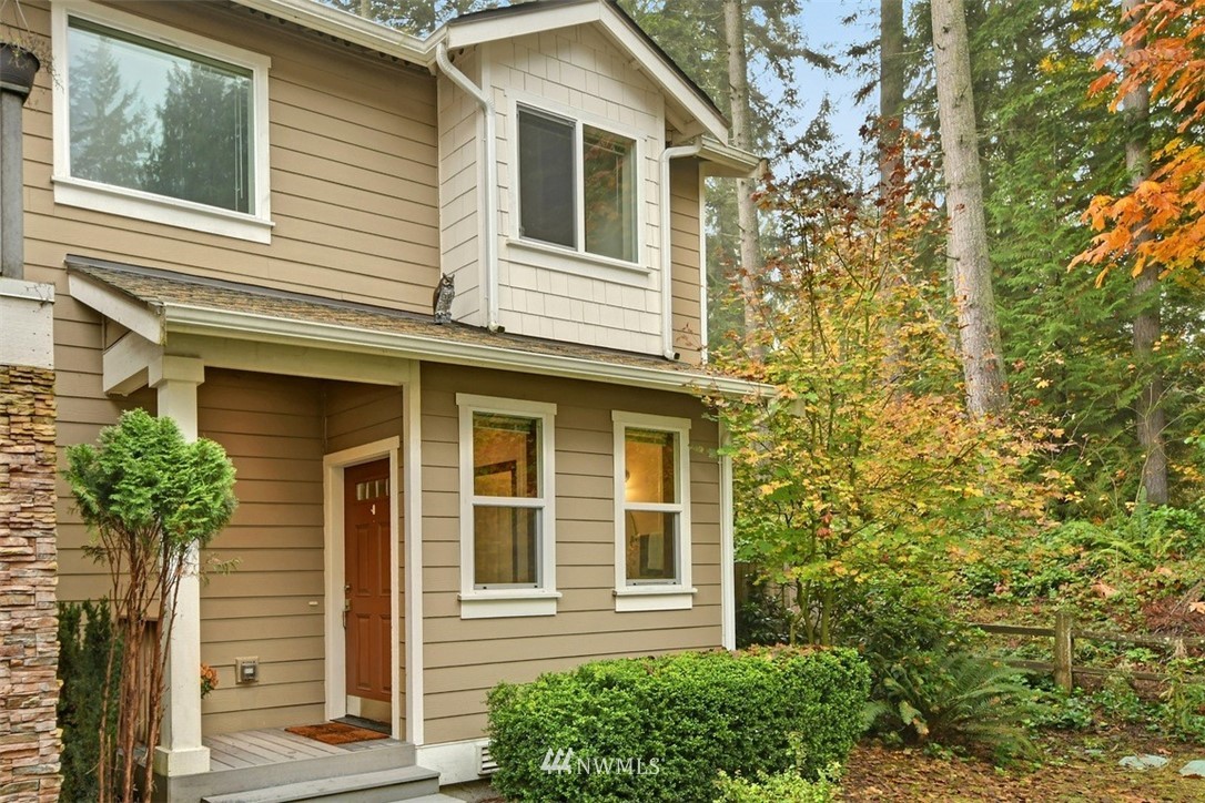 21622 11th Court Southeast Bothell, WA 98021 - Photo 1 of 19 a view of a house with potted plants and a yard