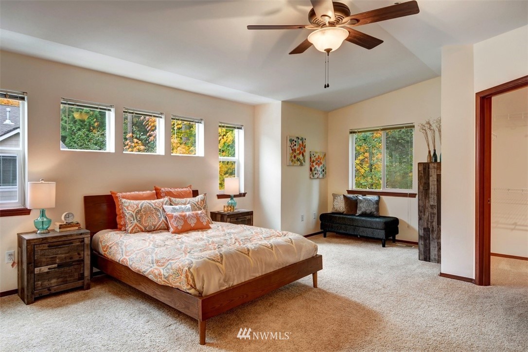 21622 11th Court Southeast Bothell, WA 98021 - Photo 13 of 19 a bedroom with a bed and a couch