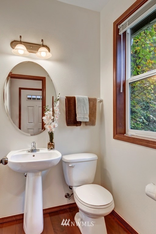 21622 11th Court Southeast Bothell, WA 98021 - Photo 8 of 19 a bathroom with a toilet sink and mirror