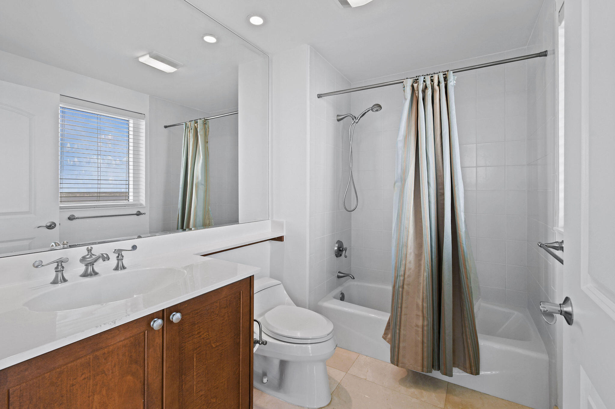 4600 North Ocean Drive, Unit 902 Singer Island, FL 33404 - Photo 26 of 79 a bathroom with a sink a toilet and shower