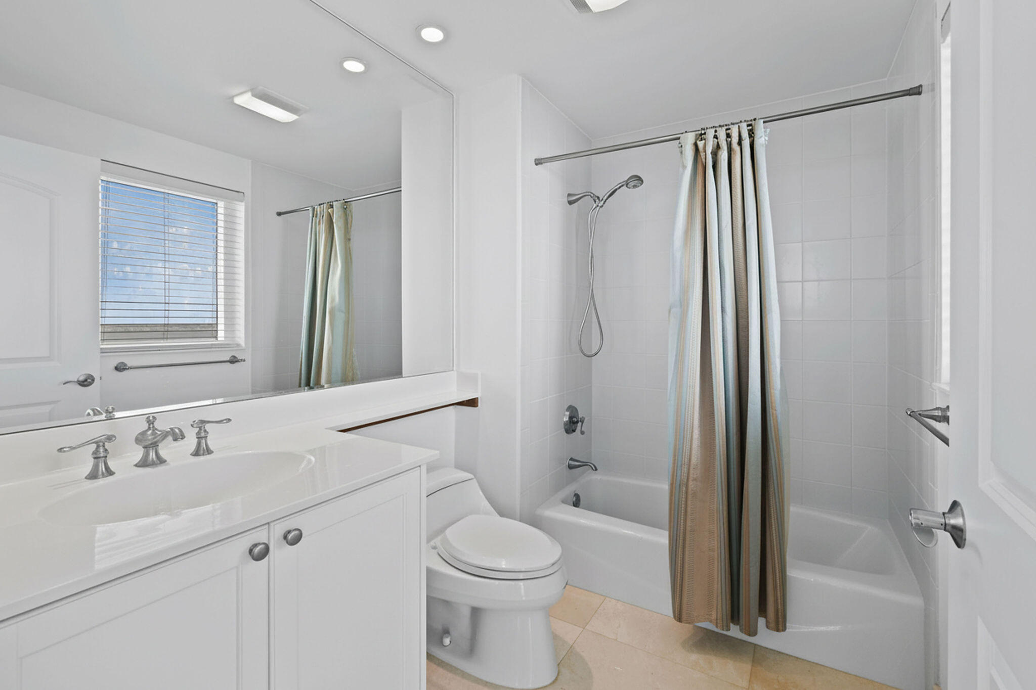 4600 North Ocean Drive, Unit 902 Singer Island, FL 33404 - Photo 27 of 79 a bathroom with a sink toilet and shower