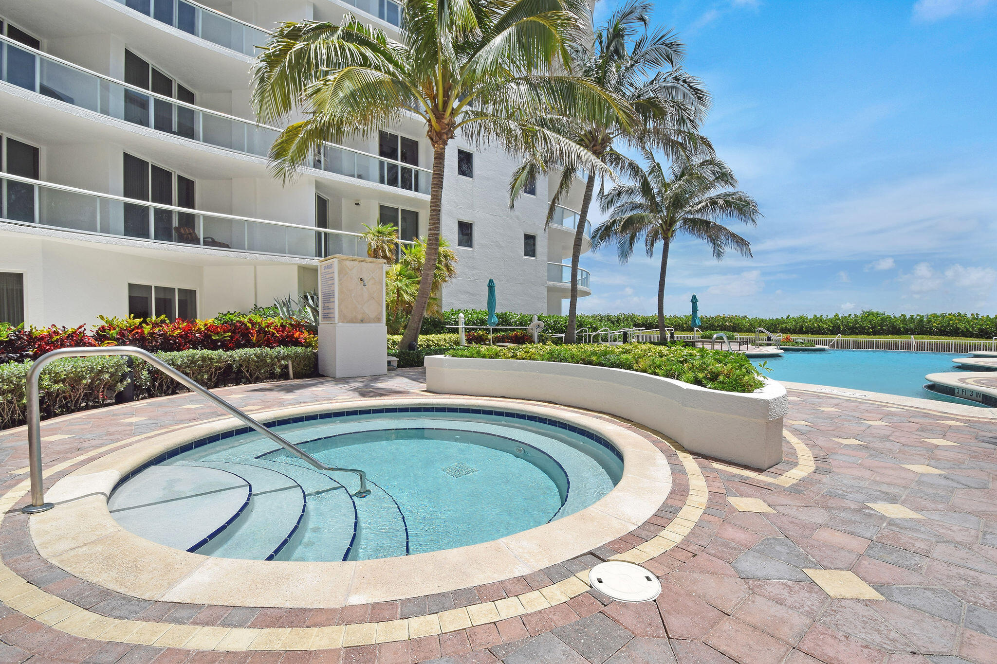 4600 North Ocean Drive, Unit 902 Singer Island, FL 33404 - Photo 54 of 79 a view of swimming pool with outdoor seating and plants