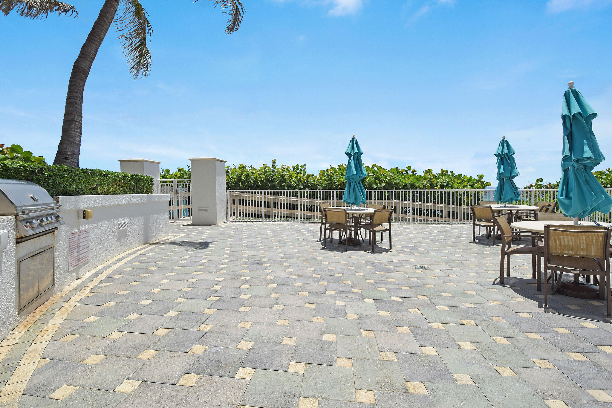 4600 North Ocean Drive, Unit 902 Singer Island, FL 33404 - Photo 55 of 79 a view of a terrace with sitting area
