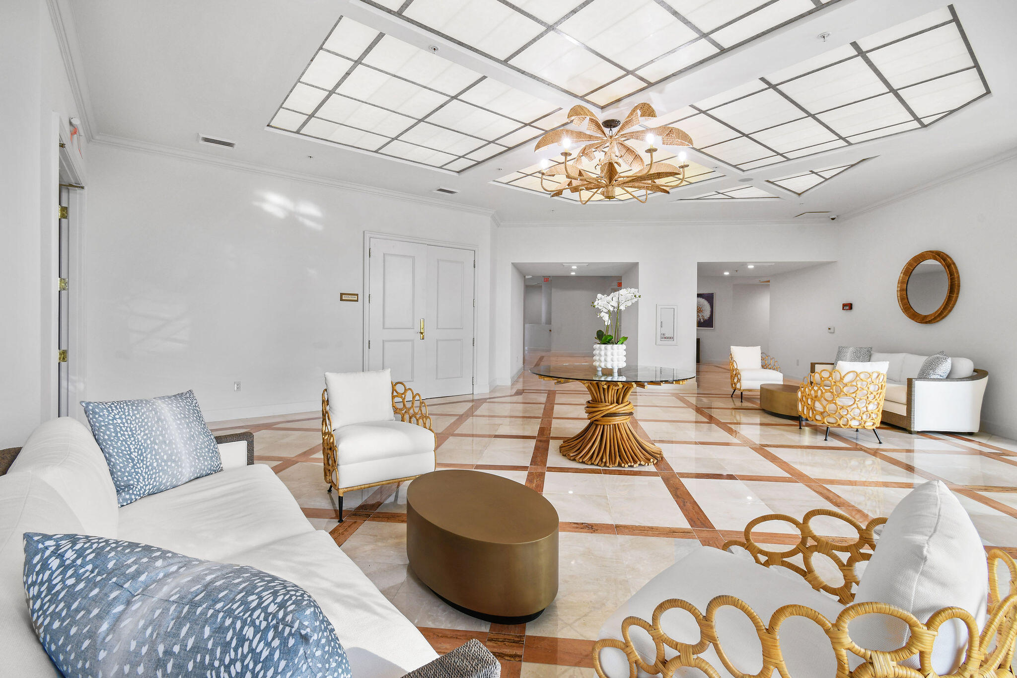 4600 North Ocean Drive, Unit 902 Singer Island, FL 33404 - Photo 67 of 79 a living room with furniture and a chandelier