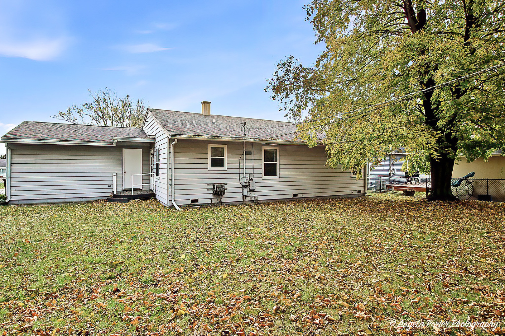 3216 Biscayne Road McHenry, IL 60050 - Photo 17 of 18 a front view of a house with a garden