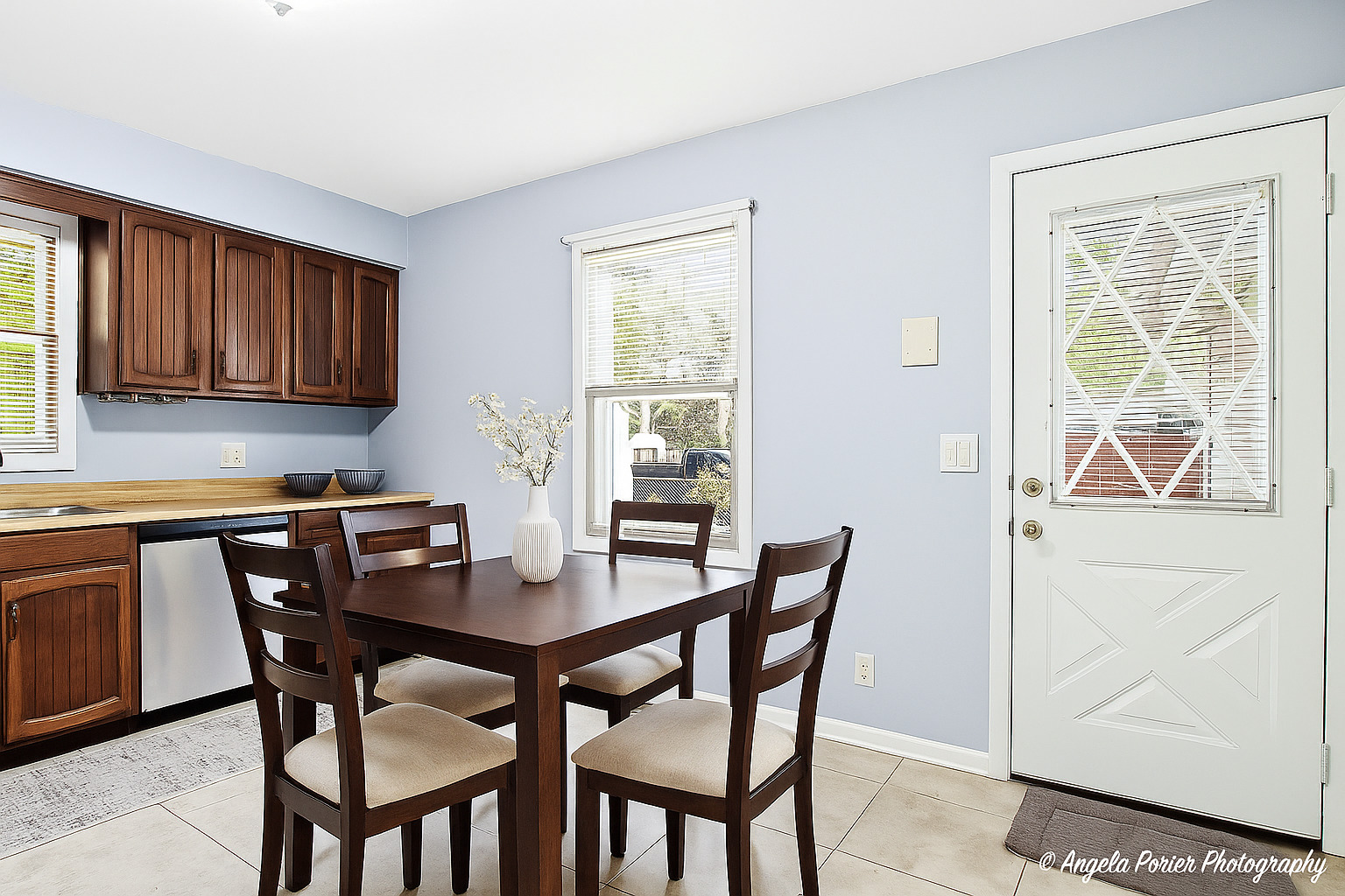 3216 Biscayne Road McHenry, IL 60050 - Photo 2 of 18 a view of a dining room with furniture and a window