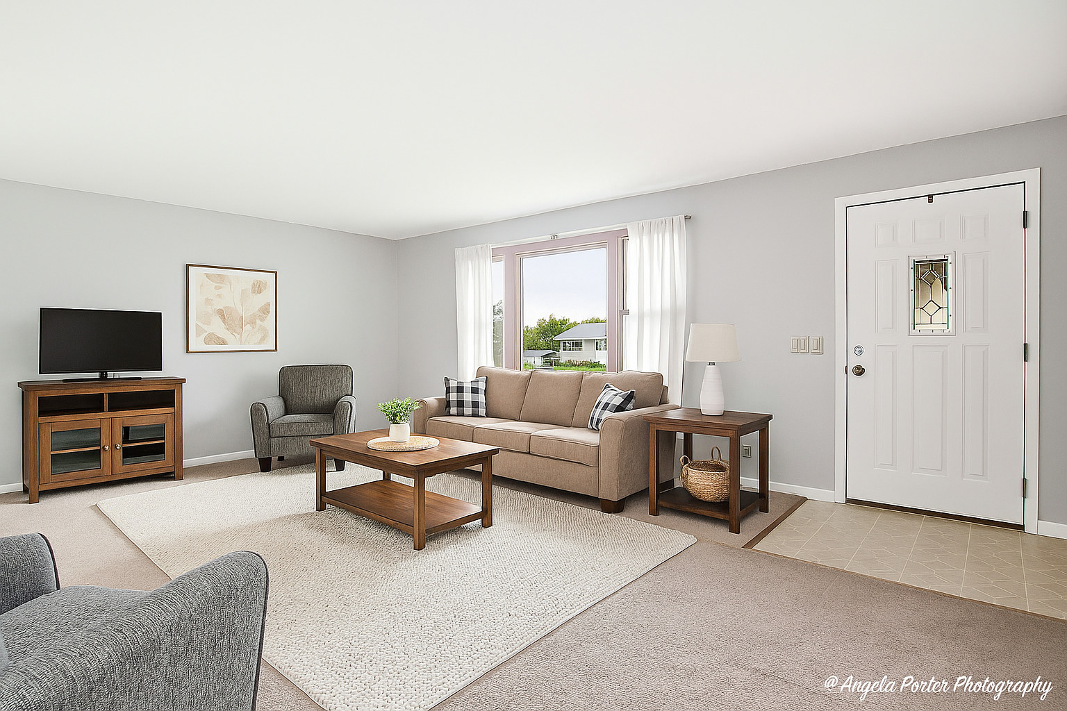 3216 Biscayne Road McHenry, IL 60050 - Photo 5 of 18 a living room with furniture and a flat screen tv