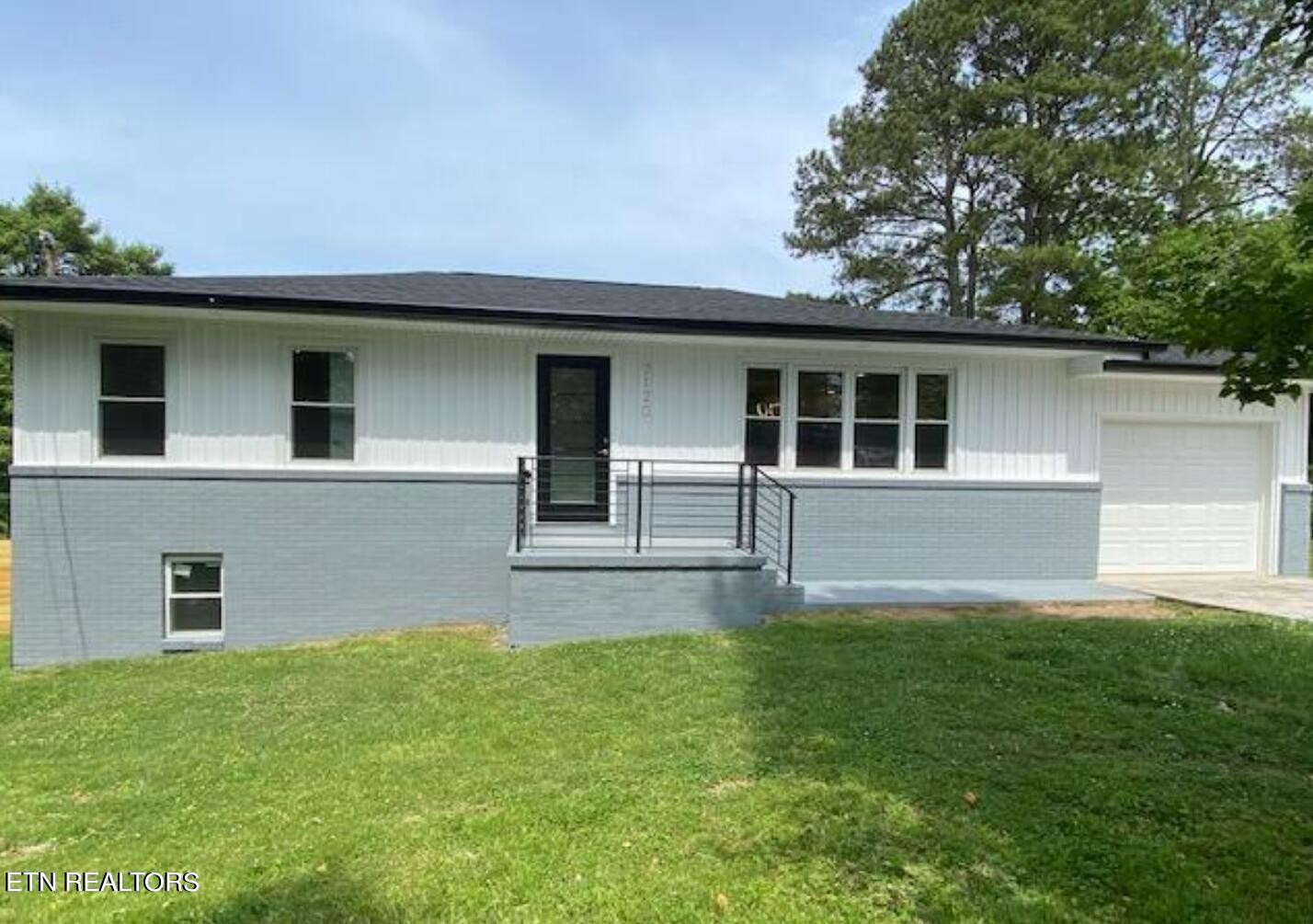 7120 Bonair Road Knoxville, TN 37918 - Photo 1 of 29 front view of a house with a yard