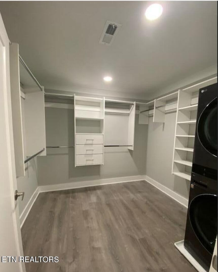 7120 Bonair Road Knoxville, TN 37918 - Photo 15 of 29 a view of walk in closet with wooden floor
