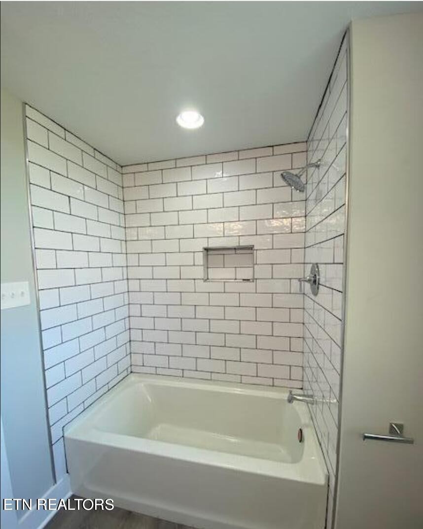 7120 Bonair Road Knoxville, TN 37918 - Photo 25 of 29 a bathroom with a bathtub and shower