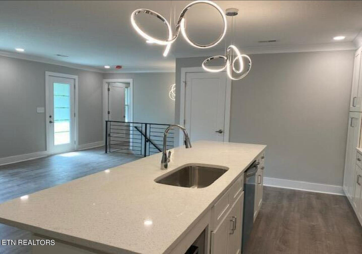 7120 Bonair Road Knoxville, TN 37918 - Photo 5 of 29 a kitchen with kitchen island stainless steel appliances a sink and a refrigerator