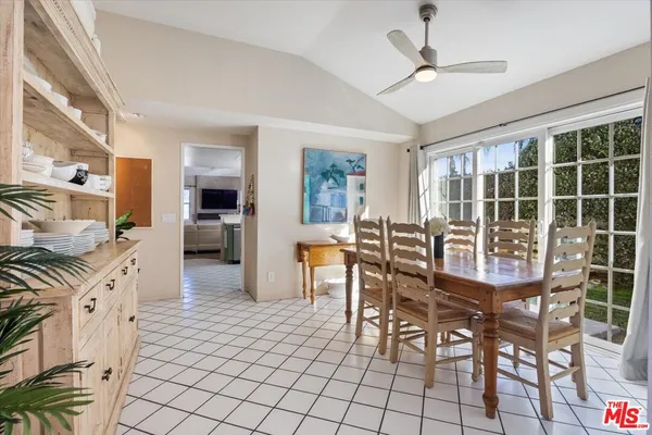 a kitchen with stainless steel appliances a sink stove and refrigerator