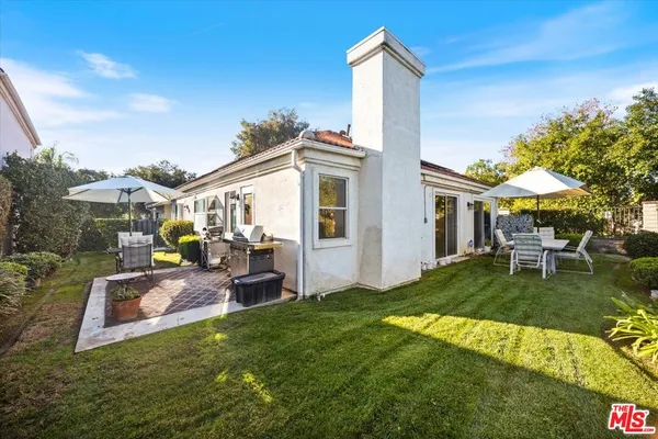 a view of a house with a patio