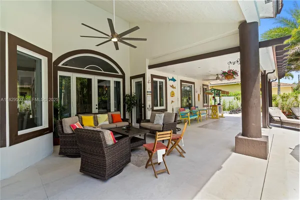 a view of swimming pool with a patio