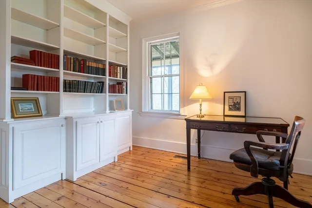 a workspace with furniture and window