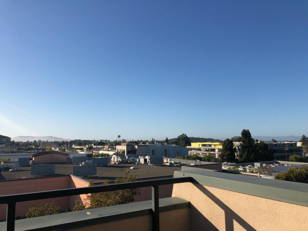 555 Laurel Avenue, Unit 610 San Mateo, CA 94401 - Photo 6 of 14 a view of a balcony with chairs