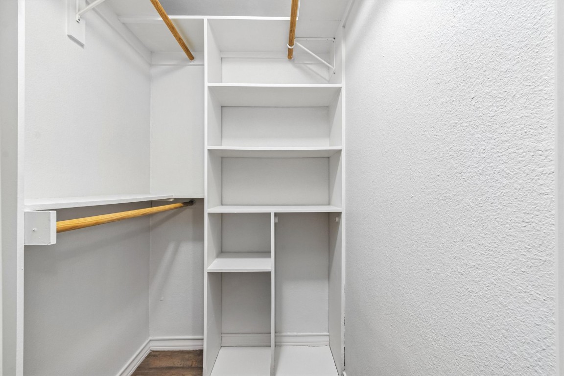 407 East 45th Street, Unit 111 Austin, TX 78751 - Photo 13 of 15 a view of walk in closet with empty racks