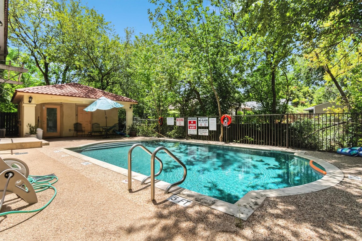 407 East 45th Street, Unit 111 Austin, TX 78751 - Photo 15 of 15 a view of a swimming pool with a patio