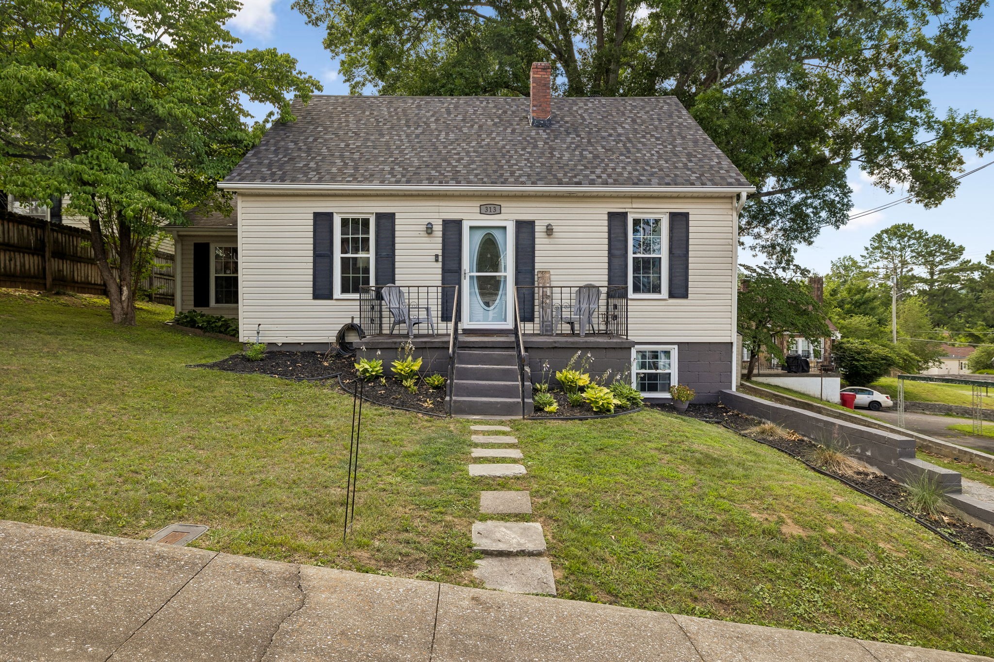 313 Cullum Street Carthage, TN 37030 - Photo 2 of 60 a front view of a house with a yard