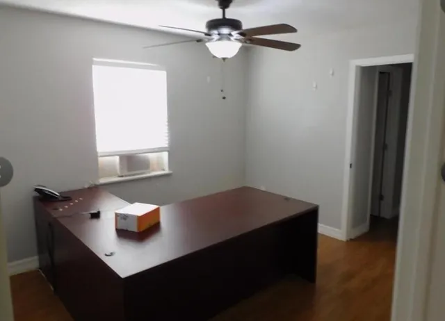 a view of table room with a window