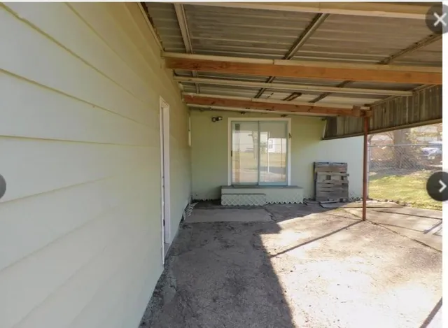 a view of a room with a bathroom