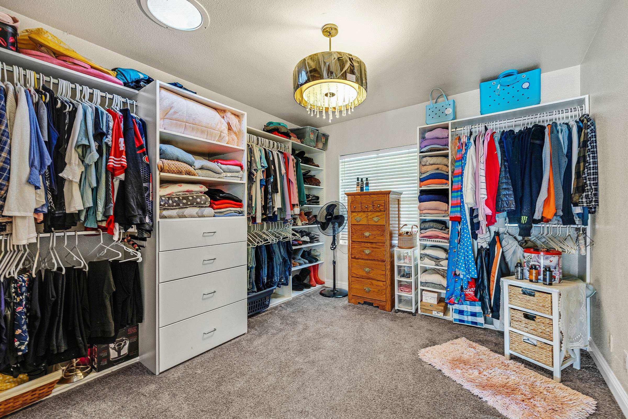 339 I Street Fremont, CA 94536 - Photo 14 of 60 a view of walk in closet with clothes