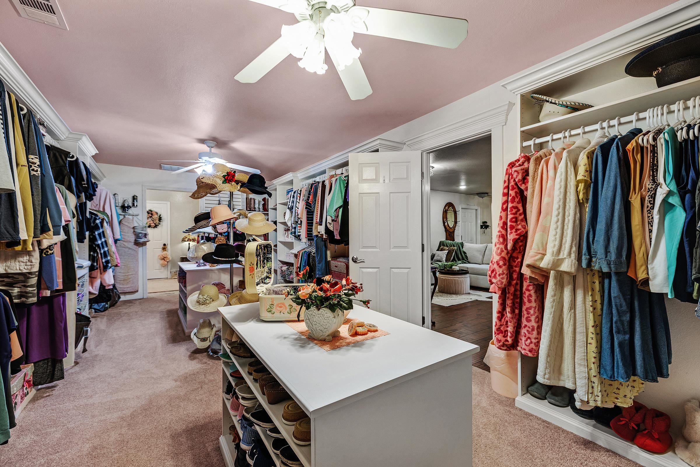 339 I Street Fremont, CA 94536 - Photo 42 of 60 a view of walk in closet with clothes and shoes