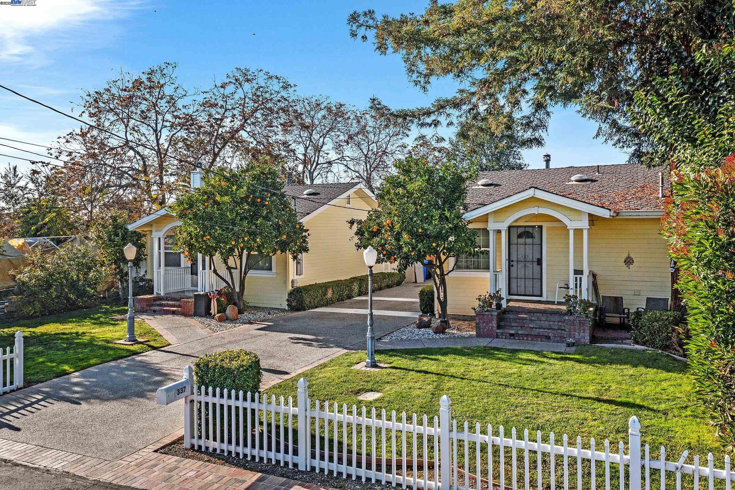 339 I Street Fremont, CA 94536 - Photo 5 of 60 a front view of a house with a garden