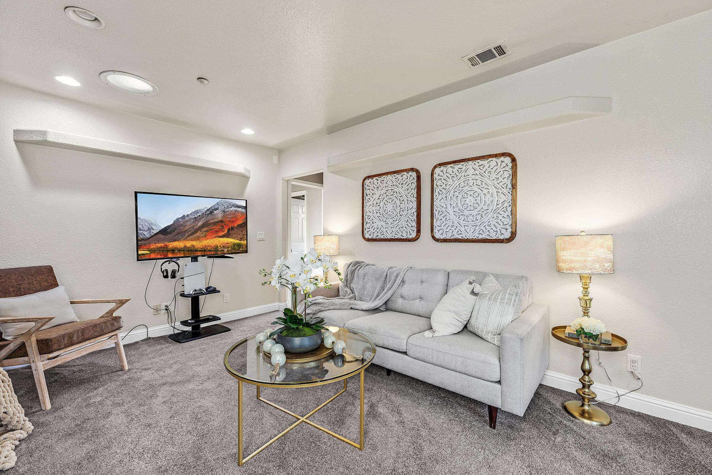 339 I Street Fremont, CA 94536 - Photo 7 of 60 a living room with furniture a lamp and a flat screen tv