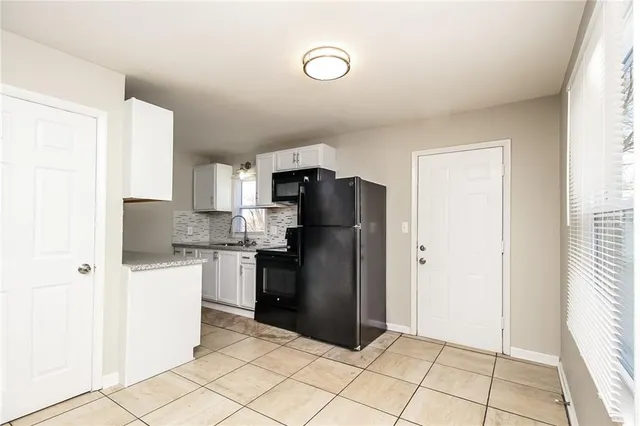 $1,755 | 7909 Garfield Avenue, Kansas City, MO 64132