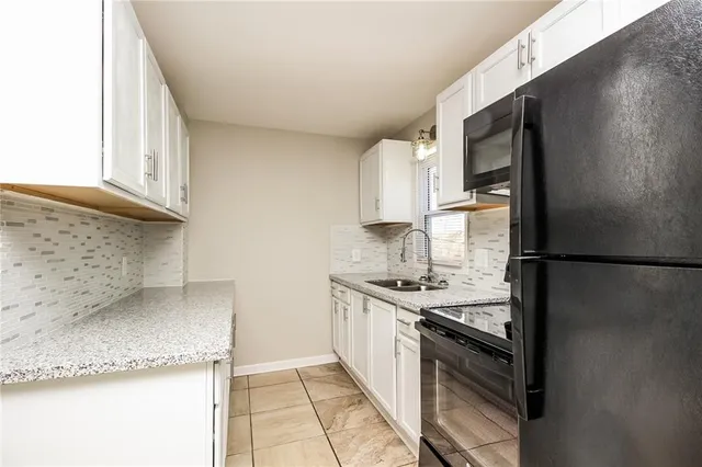 $1,755 | 7909 Garfield Avenue, Kansas City, MO 64132