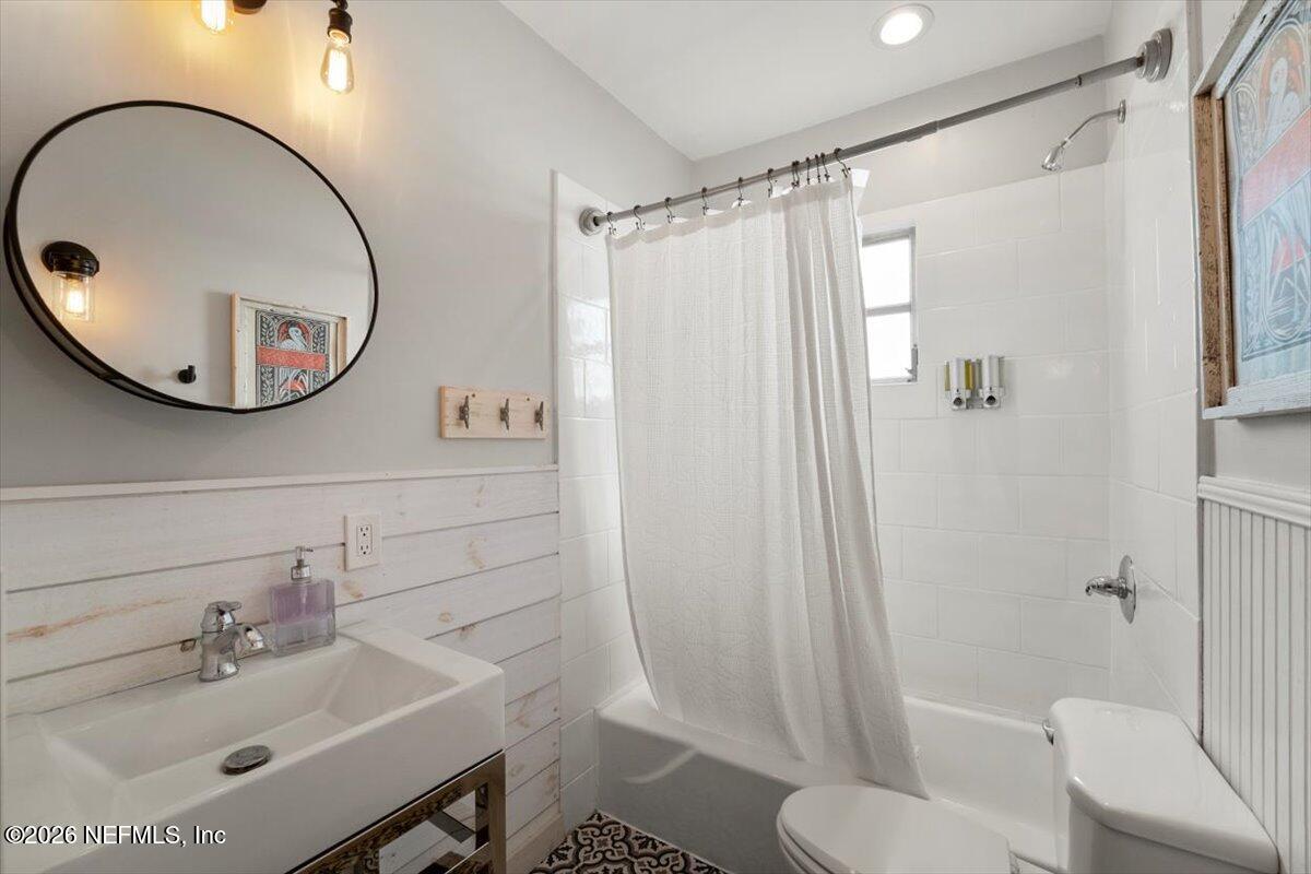 71 Kings Ferry Way St. Augustine, FL 32084 - Photo 14 of 33 a bathroom with a sink toilet and shower