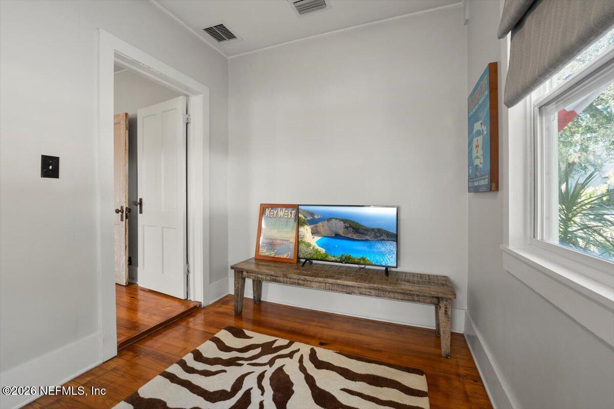 71 Kings Ferry Way St. Augustine, FL 32084 - Photo 17 of 33 a living room with furniture and a flat screen tv