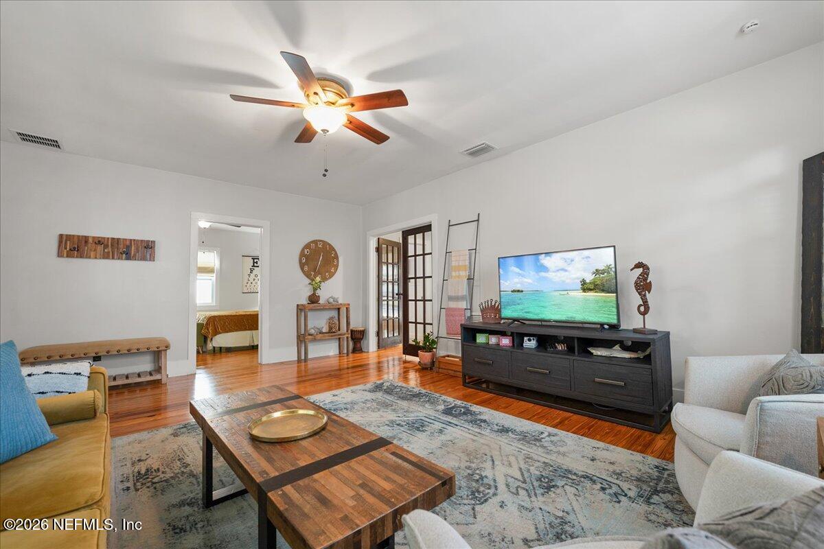 71 Kings Ferry Way St. Augustine, FL 32084 - Photo 22 of 33 a living room with furniture and a flat screen tv