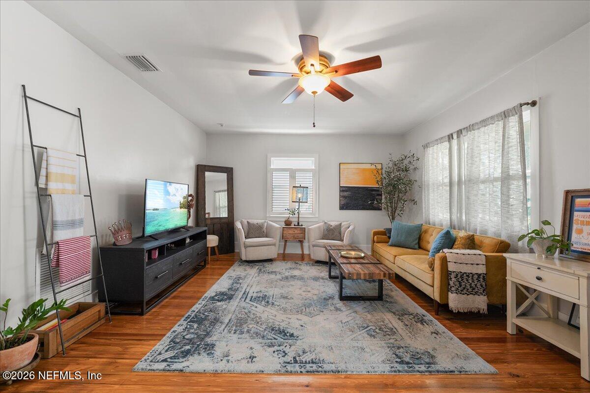 71 Kings Ferry Way St. Augustine, FL 32084 - Photo 23 of 33 a living room with furniture and a flat screen tv