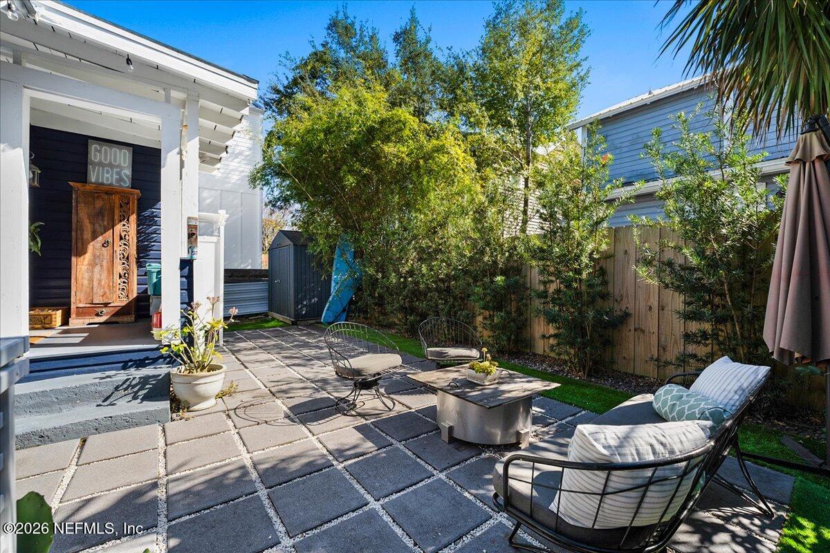 71 Kings Ferry Way St. Augustine, FL 32084 - Photo 24 of 33 a view of backyard of house with seating space