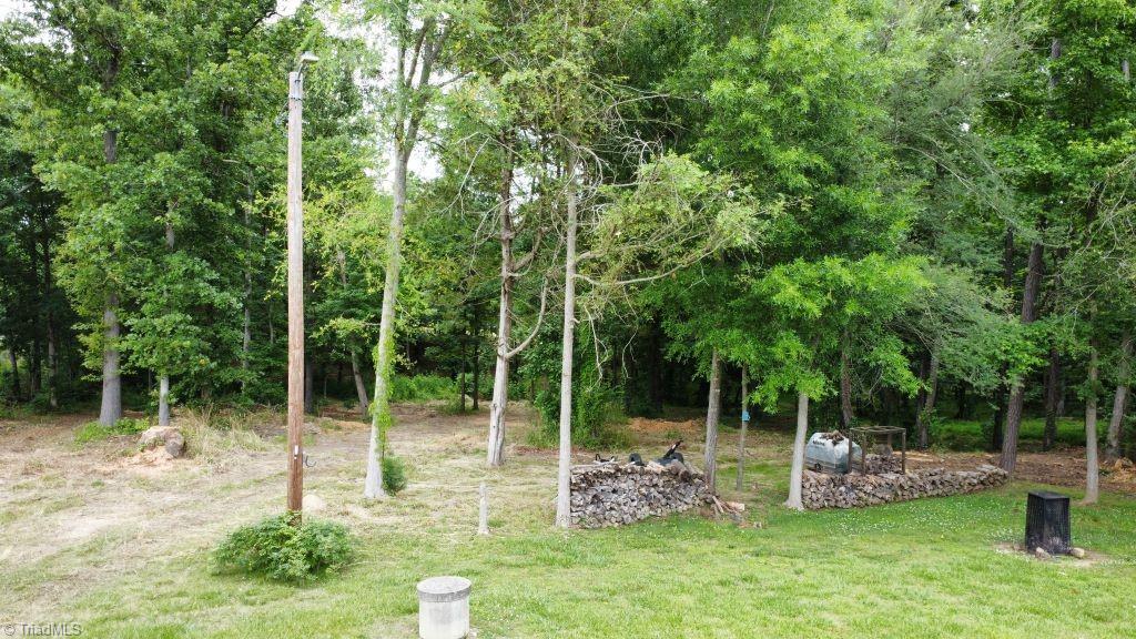 6234 Davis Mill Road Randleman, NC 27317 - Photo 32 of 35 Lawnmower/storage area in garage