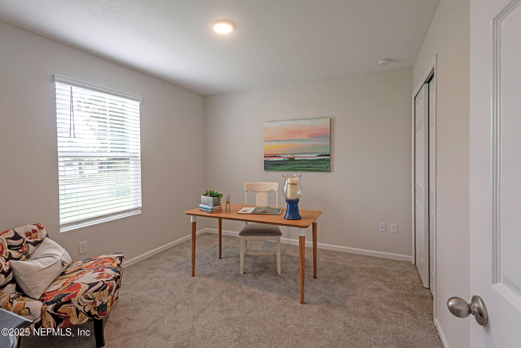 8784 Orme Road Jacksonville, FL 32220 - Photo 41 of 45 a work room with furniture and a window