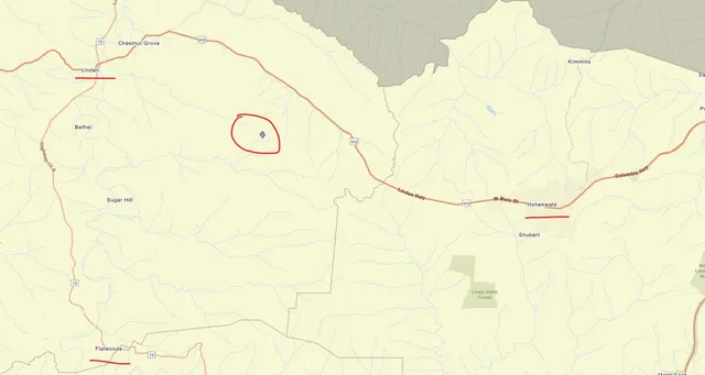 a bathroom with a shower curtain