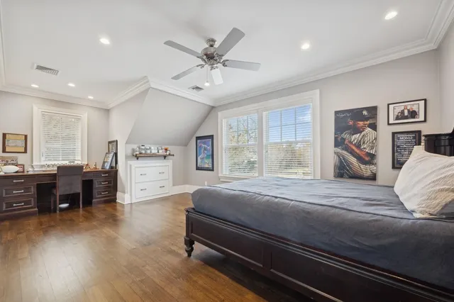 a bathroom with a granite countertop sink a toilet and a shower