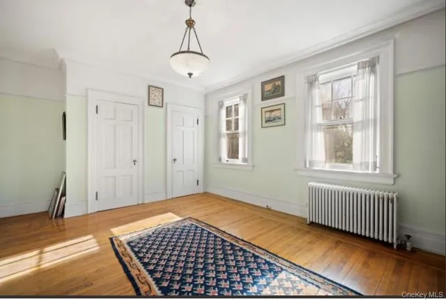 a view of a room with windows