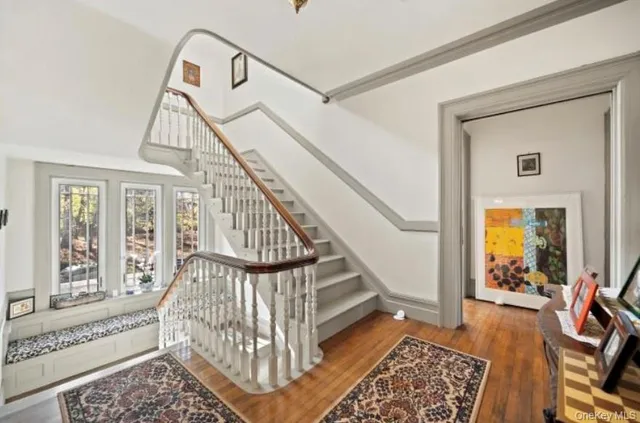 a view of entryway with wooden floor