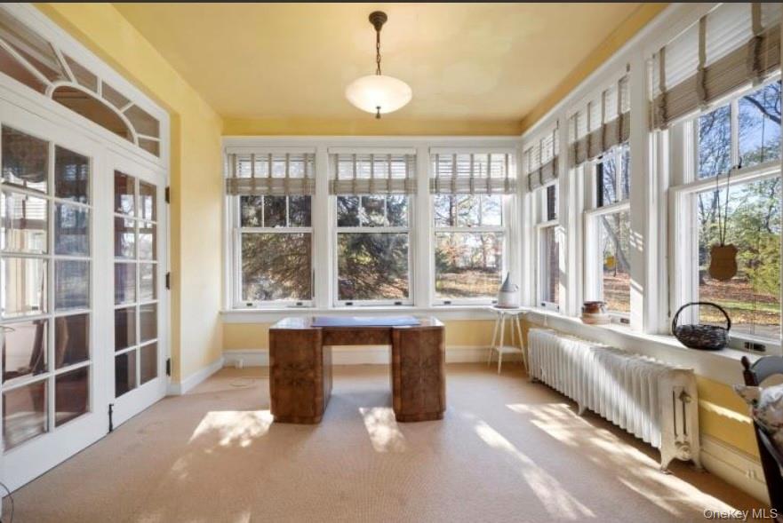 117 Leber Road Blauvelt, NY 10913 - Photo 9 of 23 a large kitchen with kitchen island a large window in it