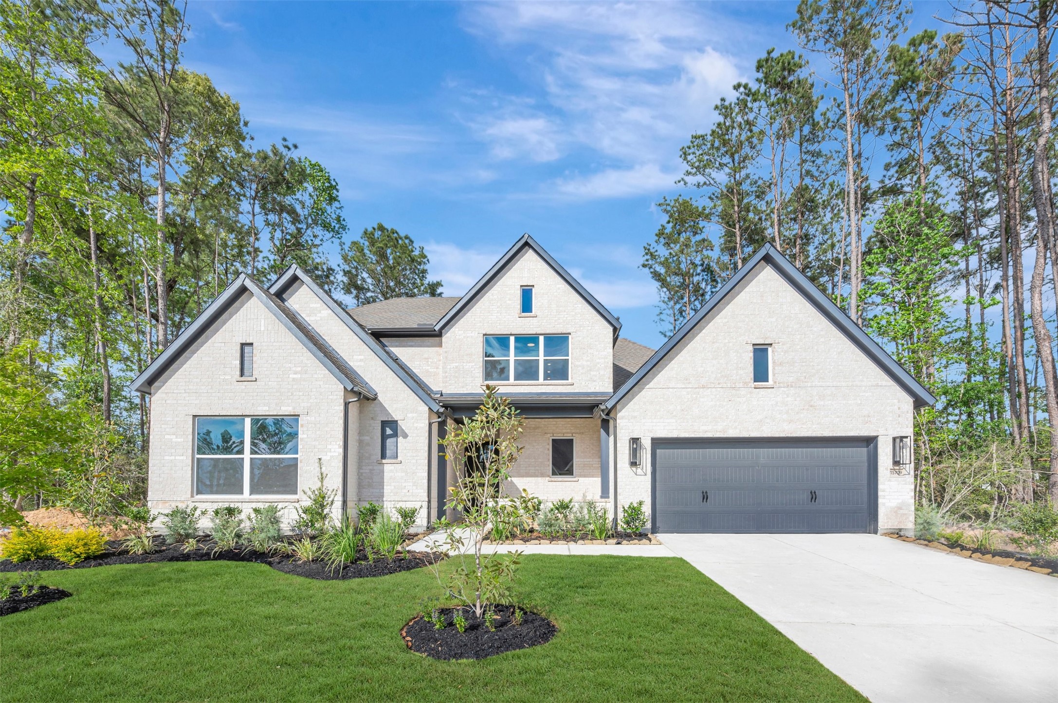15709 Terracotta Terrace Conroe, TX 77302 - Photo 1 of 50 Welcome to The Broomfield by David Weekley Homes.